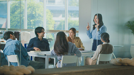 Marketing woman leader team brainstorming creative strategy analysis business growth sharing ideas collaboration for corporate success developing advertising campaigns discussing digital marketing