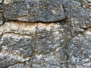 Old Stone Wall. Rock in the Forest. Fragment of a rock seen in the Greek Forest, Athens