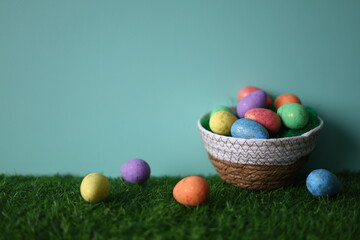 Easter composition of eggs in a basket