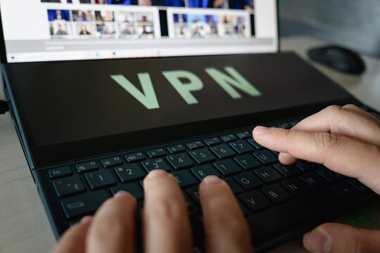man uses vpn creation Internet protocols for protection private network on screen computer laptop