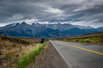 Highway crossing patagonian forest landscape, rio negro, argentina
