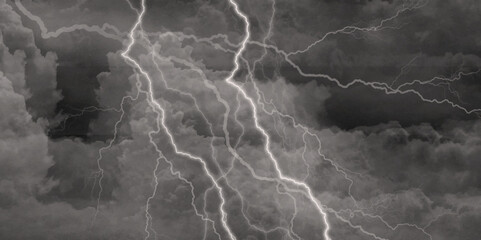 Thunder, lightnings and rain on a stormy summer night in black and white. 