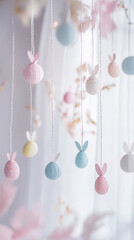 Pastel easter garland in soft pink and blue hues - perfect for spring celebration decor and craft inspiration
