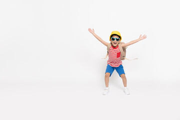 Asian little boy in red striped shirt summer outfits with yellow hat dancing and smiling with backpack isolated on white background, Six years old, Summer Season concepts