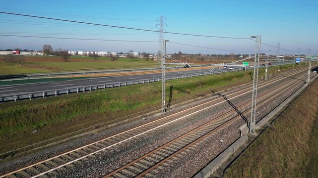 Europe, Italy , Milan - Frecciarossa  Hight speed 300km h train railway from Milan  to Turin  view from the drone - the faster way to travel in Italy for tourist and passengers - tourist destination 