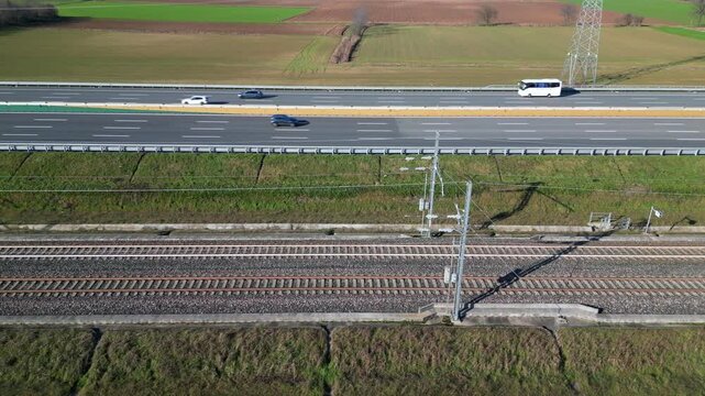 Europe, Italy , Milan - Frecciarossa  Hight speed 300km h train railway from Milan  to Turin  view from the drone - the faster way to travel in Italy for tourist and passengers - tourist destination 
