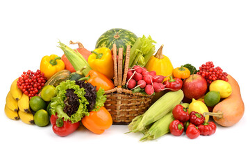 Healthy fresh vegetables and fruits in willow basket isolated on white