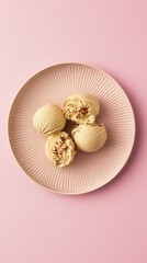 Delicate Pistachio Ice Cream Scoops with Almonds on a Pastel Plate