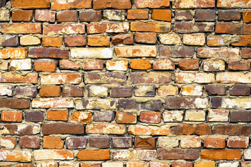 stonework of red cobblestones, old brick wall background