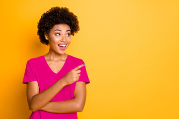 Photo of charming cheerful cute nice attractive girlfriend pointing at something rejoicing while...