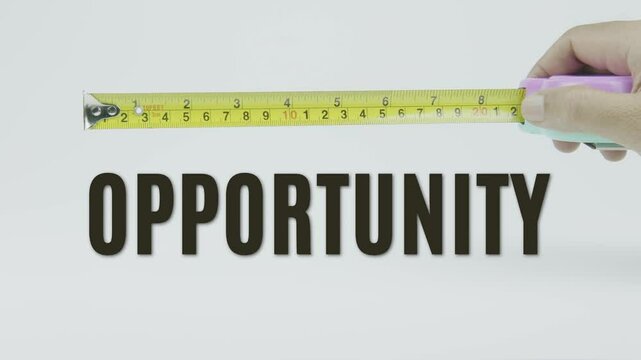 "Opportunity" text with a tape measure on a white background, symbolizing precision, accuracy, and sizing in a clean, minimal style