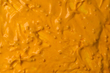 Yellow sauce splashes as a background.
