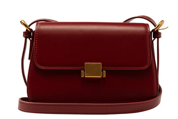 Burgundy shoulder leather bag isolated on white background.
