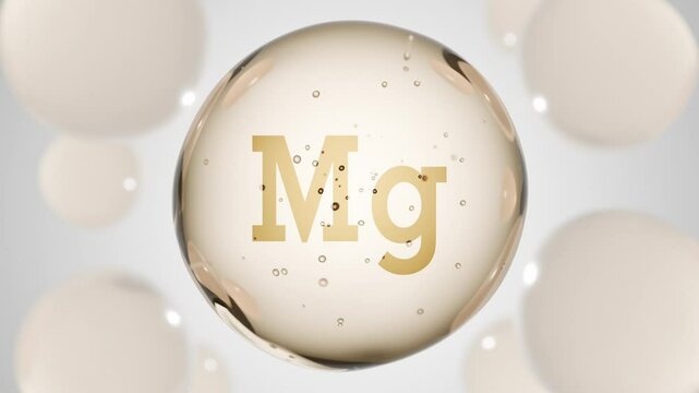 A golden glossy sphere with mineral Mg. Magnesium pill capsule. Abstract 3D bubble drop background
