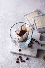 Freshly brewed drip coffee in glass cup