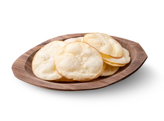 Smoked provolone cheese chips in a bowl isolated over white background