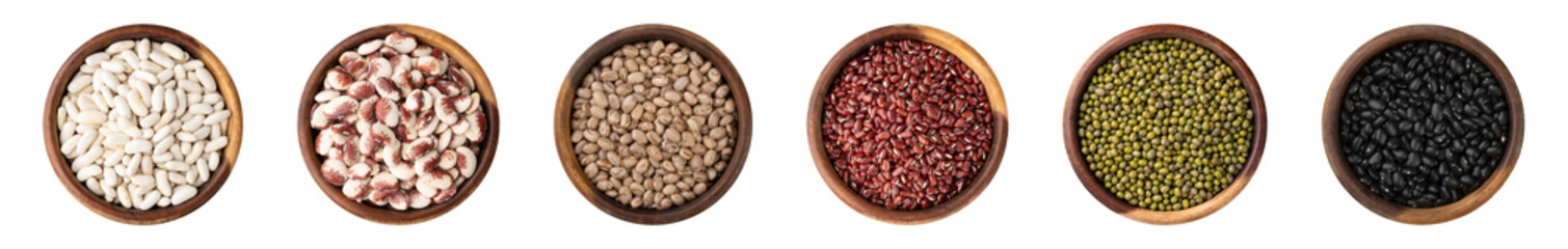 Raw assorted beans on wooden bowls isolated over white background