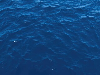Obraz premium Deep blue oceanic texture with wavy ripples, waves, ocean waves