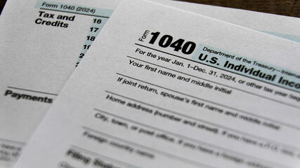 Tax return documents highlighting important financial information for 2024