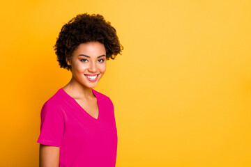 Close up photo of amazing dark skin lady with beaming smile wear orange v neck t-shirt isolated...
