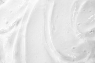 Cosmetic gel, serum transparent sample. Liquid cream with bubble texture. Gel texture of a cosmetic...