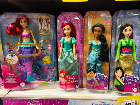 Lviv, Ukraine - February 16, 2025: Assorted Disney Princess dolls in colorful packaging displayed on store shelves
