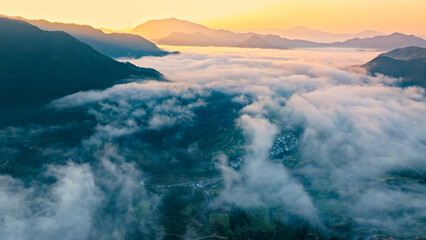 Aerial photography of beautiful countryside with morning mist and sea of clouds