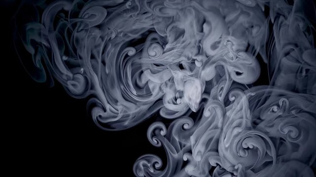 Abstract swirling smoke pattern against dark background, ethereal and mysterious atmosphere concept