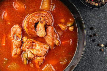 Tomato soup meat vegetable goulash fresh tasty food dish gourmet food background on the table rustic food top view copy space
