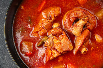 Tomato soup meat vegetable goulash fresh tasty food dish gourmet food background on the table rustic food top view copy space