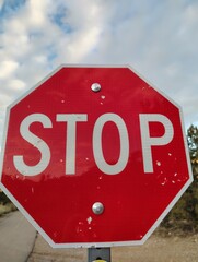 stop sign against blue sky
