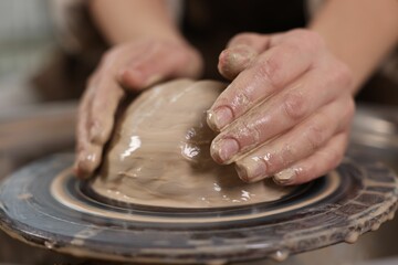 Hobby and craft. Woman making pottery indoors, closeup