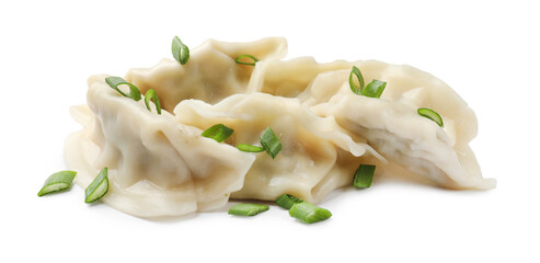 Fresh gyoza dumplings with pieces of green onion isolated on white