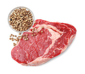Piece of raw beef meat and spices isolated on white, top view