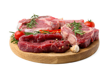 Pieces of raw beef meat, spices and tomatoes isolated on white