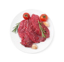 Pieces of raw beef meat, spices and tomatoes isolated on white, top view