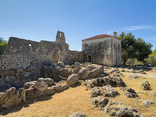 Meospotamos, Greece - July 3, 2024: Necromanteion of Acheron. North facade of building with red...