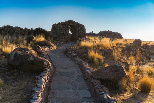 Stone arch and entrance to the Pachamama sanctuary on Amantani Island on the shores of Lake Titicaca in Peru