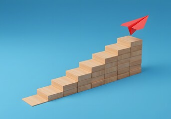 Staircase of Wooden Blocks Leading to Red Paper Airplane