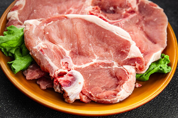 Raw pork on bones meat fresh tasty food dish delicious gourmet food background on the table rustic food top view copy space