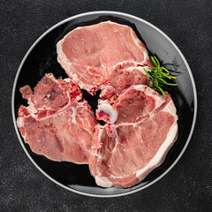 Raw pork on bones meat fresh tasty food dish delicious gourmet food background on the table rustic food top view copy space