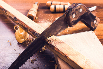 Manual wood worker carpenter with saw with safety tools