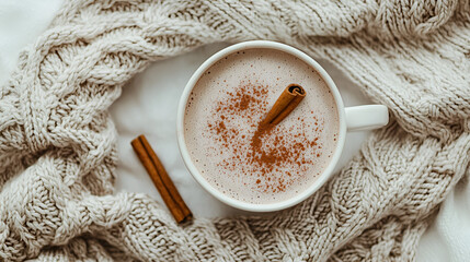 Warm beverage with cinnamon in a cozy setting, creating a relaxing and comforting vibe for chilly days.