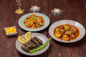 Menorah lighted candles in candlesticks with the Star of David at the set table chelnt, bulgr