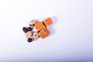 different candy on white background