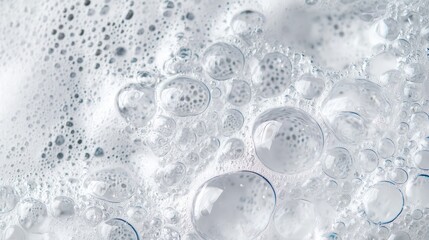 A mesmerizing formation of tiny bubbles and thick foam fills the space, reflecting soft light while providing a comforting presence. The texture exudes freshness and relaxation, inviting serenity