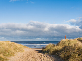 Path to Warkworth beach in Northumberland, UK with copy space.