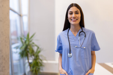 Portrait of a young Latina nurse in a medical uniform