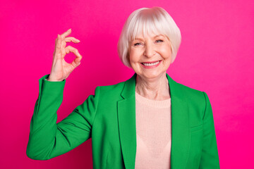 Close-up portrait of nice attractive lovely cheerful cheery content gray-haired lady wearing blue...