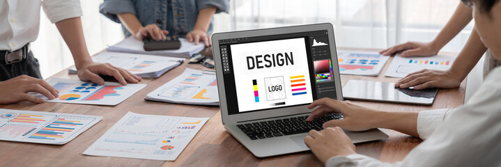 Graphic designer software for modern design of web page and commercial brisk ads showing on the...